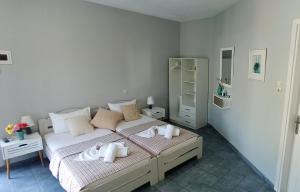 Postel nebo postele na pokoji v ubytování Allegria Family Hotel