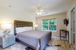a bedroom with a large bed and a window at Villa Katrin in Naples +25 photos