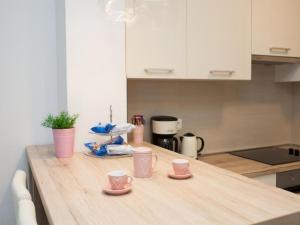 Kuchyňa alebo kuchynka v ubytovaní Crystal Apartment