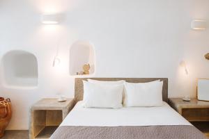 Postel nebo postele na pokoji v ubytování Aetheria Villas