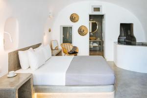 Postel nebo postele na pokoji v ubytování Aetheria Villas