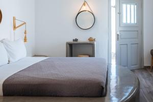 Postel nebo postele na pokoji v ubytování Aetheria Villas