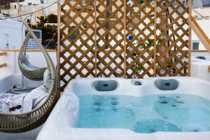 Fotografie z fotogalerie ubytování Aetheria Villas v destinaci Oia + 37 fotografií