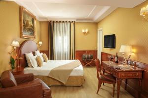 TV a/nebo společenská místnost v ubytování Hotel Homs