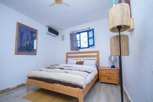 Voodi või voodid majutusasutuse USHA Guest House toas