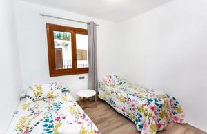 Postel nebo postele na pokoji v ubytování BONITO APARTAMENTO PARA 4 PERSONAS, CENTRO DE MORAIRA