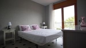 Ein Bett oder Betten in einem Zimmer der Unterkunft CALA 51 - Smart Stay in Blanes Most Exclusive Cove