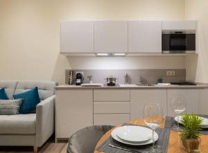 Kuchyňa alebo kuchynka v ubytovaní Home Art Apartments Málaga