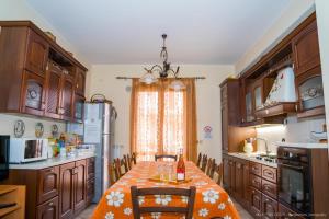 Η κουζίνα ή μικρή κουζίνα στο Casa vacanze ETNA COCUS