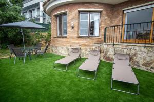 Ein Garten an der Unterkunft CALA 51 - Smart Stay in Blanes Most Exclusive Cove