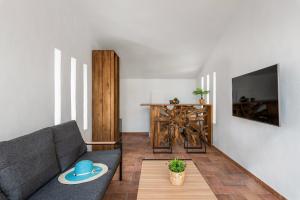 A television and/or entertainment centre at Villa Ibiza