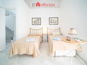 Posteľ alebo postele v izbe v ubytovaní El Anfitrión - Casa Denise