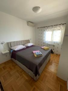 Posteľ alebo postele v izbe v ubytovaní Villa Makar,heated pool,gym,grill,seaview