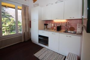 Kuchyň nebo kuchyňský kout v ubytování B&B Romantico Palazzo dei Ulivi