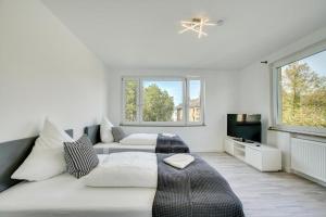 Katil atau katil-katil dalam bilik di Stay Here ND Apartments