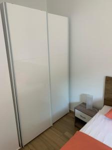 Posteľ alebo postele v izbe v ubytovaní Apartman Nataša