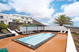 Bazén v ubytování La Vega de Lanzarote 4 nebo v jeho okolí