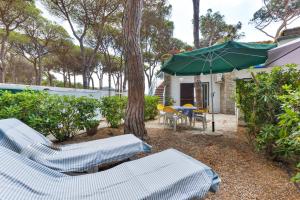 A garden outside Villa Fantagali apt 502