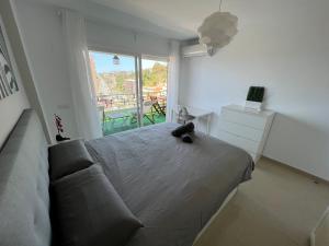 Postel nebo postele na pokoji v ubytování Apartamento Carihuela Torremolinos + 37 fotografií