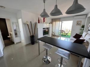 Kuchyň nebo kuchyňský kout v ubytování Apartamento Carihuela Torremolinos