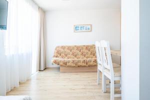 Posezení v ubytování Willa Promyk + 24 fotografií