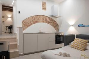 a kitchen with a sink and a counter top at ALLA QUERCIA - CENTRO STORICO in Monterotondo