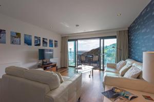 Posezení v ubytování The Boats