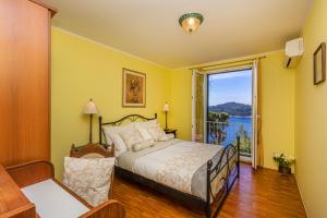 Postel nebo postele na pokoji v ubytování Apartment Big One Dubrovnik