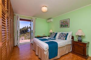 Postel nebo postele na pokoji v ubytování Apartment Big One Dubrovnik