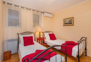 Postel nebo postele na pokoji v ubytování Apartment Big One Dubrovnik