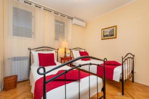 Postel nebo postele na pokoji v ubytování Apartment Big One Dubrovnik