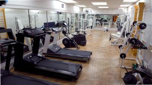 a gym with treadmills and elliptical machines at Torres de Manantiales Apart Hotel in Mar del Plata