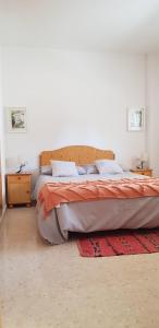 A bed or beds in a room at Apartamento C2 1Dormitorio