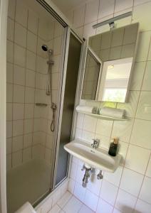 Kúpeľňa v ubytovaní Pension Rohrer am Murradweg - Ehrenhausen an der Weinstrasse