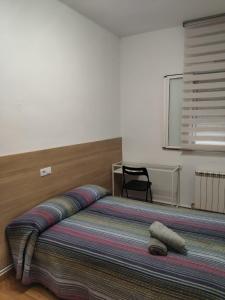 Ένα ή περισσότερα κρεβάτια σε δωμάτιο στο Apartamento Como en tu casa