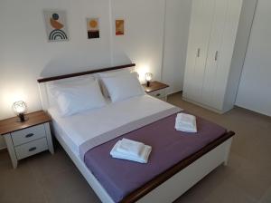 Postel nebo postele na pokoji v ubytování Melograno Apartment