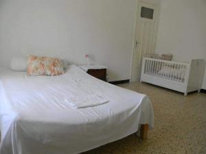 Una cama o camas en una habitación de vacance Mahdia