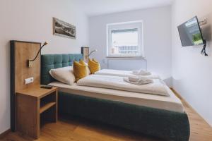 Posteľ alebo postele v izbe v ubytovaní Spa Chalet by we rent