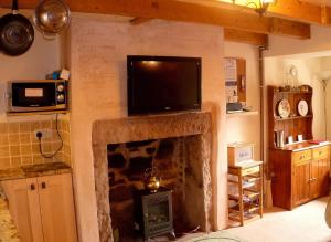 A television and/or entertainment center at Tweed Cottage 