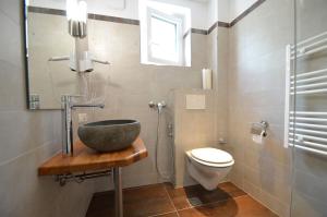 Koupelna v ubytování Deluxe Studio Kaprun by All in One Apartments + 33 fotografií
