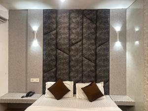 Cama o camas de una habitación en Hotel Pardesi's