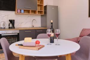 Kuchyňa alebo kuchynka v ubytovaní Apartment Kaleta