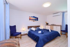 Posteľ alebo postele v izbe v ubytovaní Apartment Kaleta