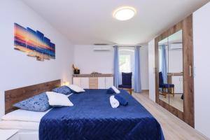 Posteľ alebo postele v izbe v ubytovaní Apartment Kaleta