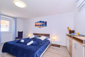 Posteľ alebo postele v izbe v ubytovaní Apartment Kaleta