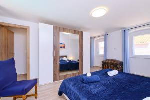 Posteľ alebo postele v izbe v ubytovaní Apartment Kaleta