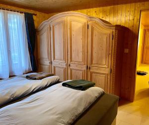 En eller flere senge i et værelse på Schöne Ferienwohnung mit Seeblick