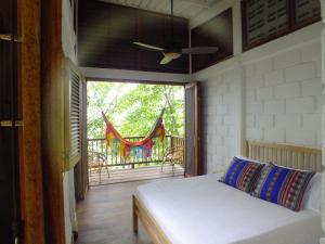 Postel nebo postele na pokoji v ubytování Casa Galú - Capurganá