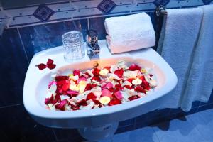 a bowl of food in a sink in a bathroom at Hôtel Riad Salam Agadir in Agadir