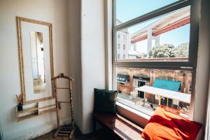 Ein Sitzbereich in der Unterkunft LX Hostel
